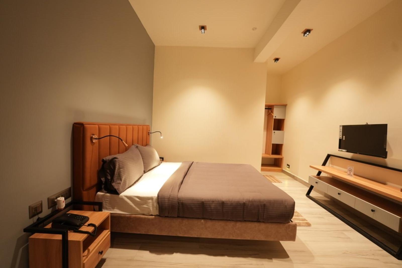 Aura Crimson Vistas Hotell Kodaikanal Rom bilde