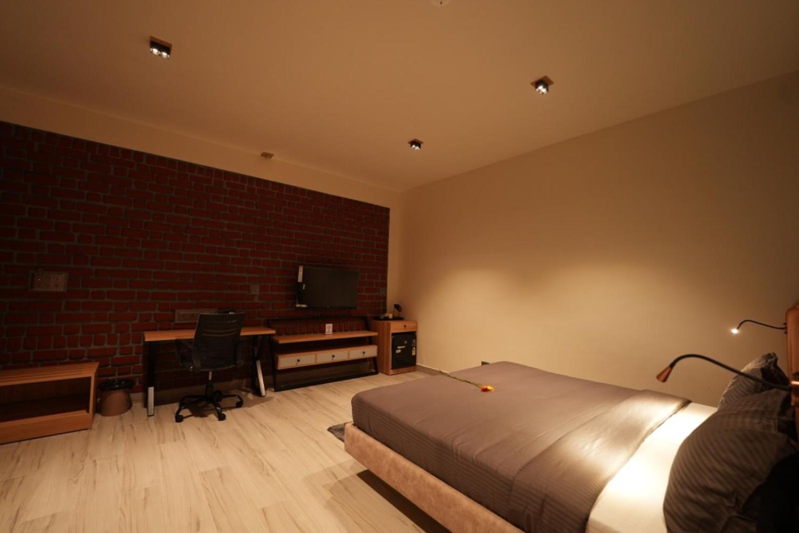 Aura Crimson Vistas Hotell Kodaikanal Rom bilde