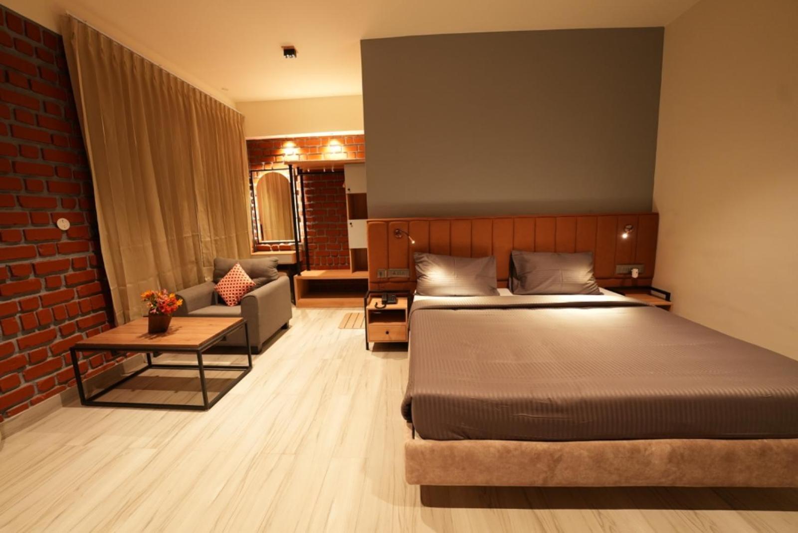 Aura Crimson Vistas Hotell Kodaikanal Rom bilde