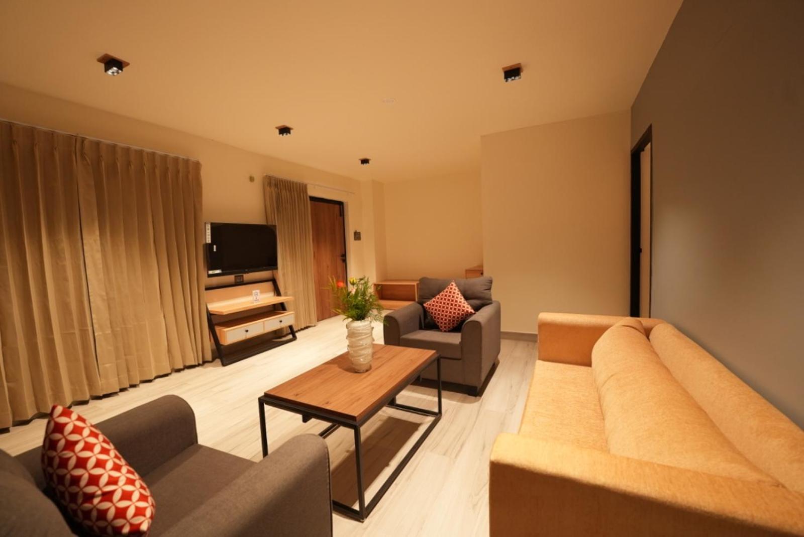 Aura Crimson Vistas Hotell Kodaikanal Rom bilde